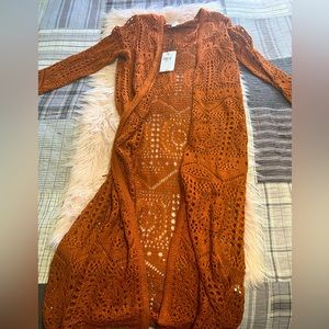 Very cute wool cardigan with design holes